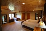 Master Bedroom with Two Twin Beds in White Mountain Vacation Home